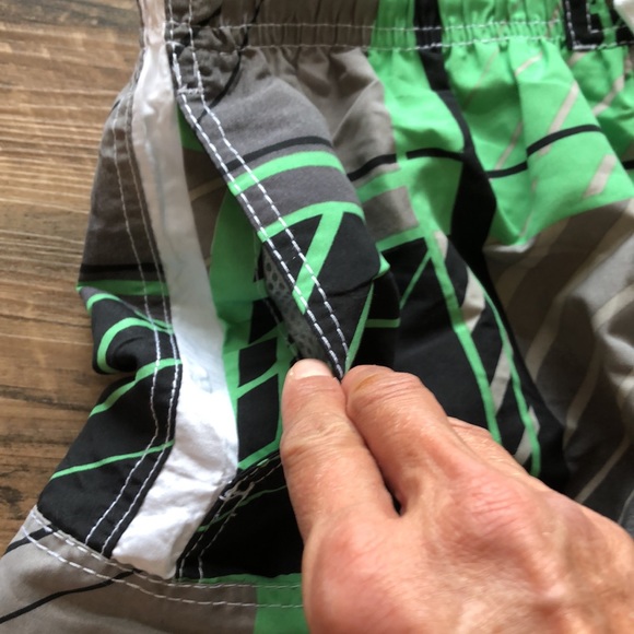 B. Split men’s swim shorts - Picture 9 of 11